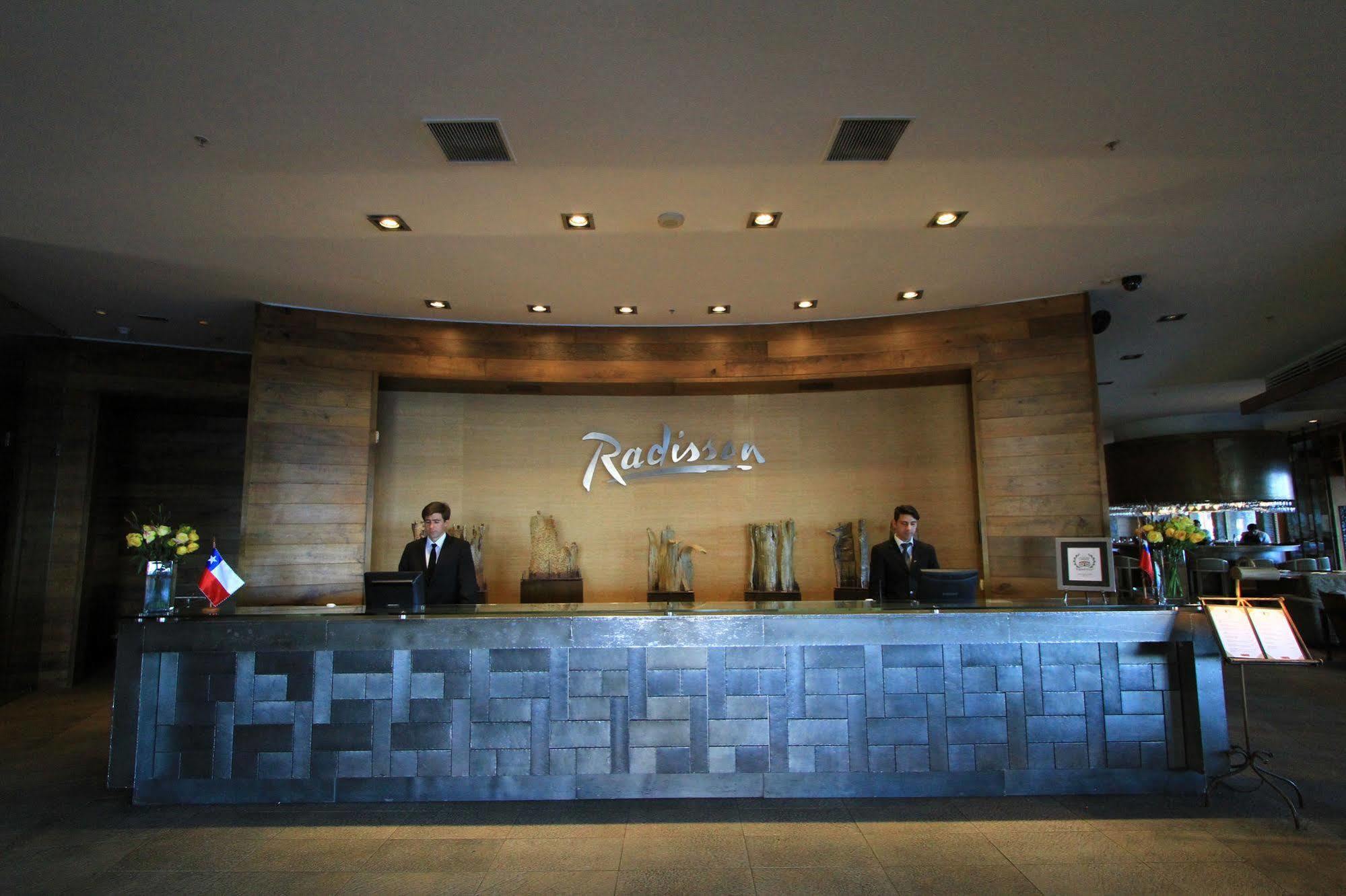Radisson Hotel Puerto Varas Exterior photo Reception desk at Radisson Blu Hotel, Paris, France